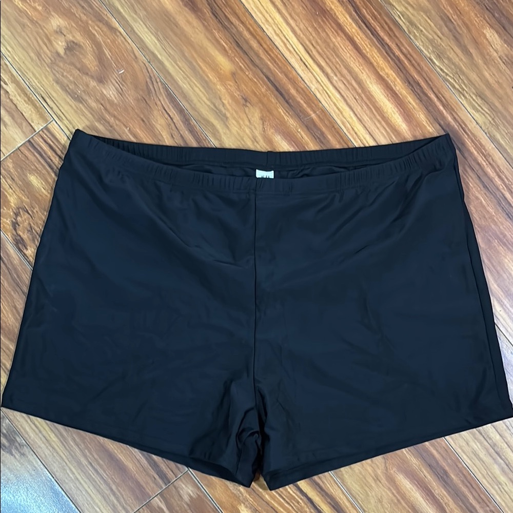 Black swim shorts, size 20W, NWOT.